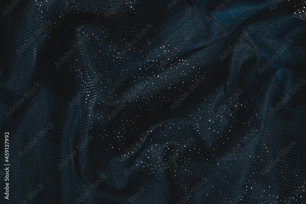 Obraz premium Dark green fabric with sequins