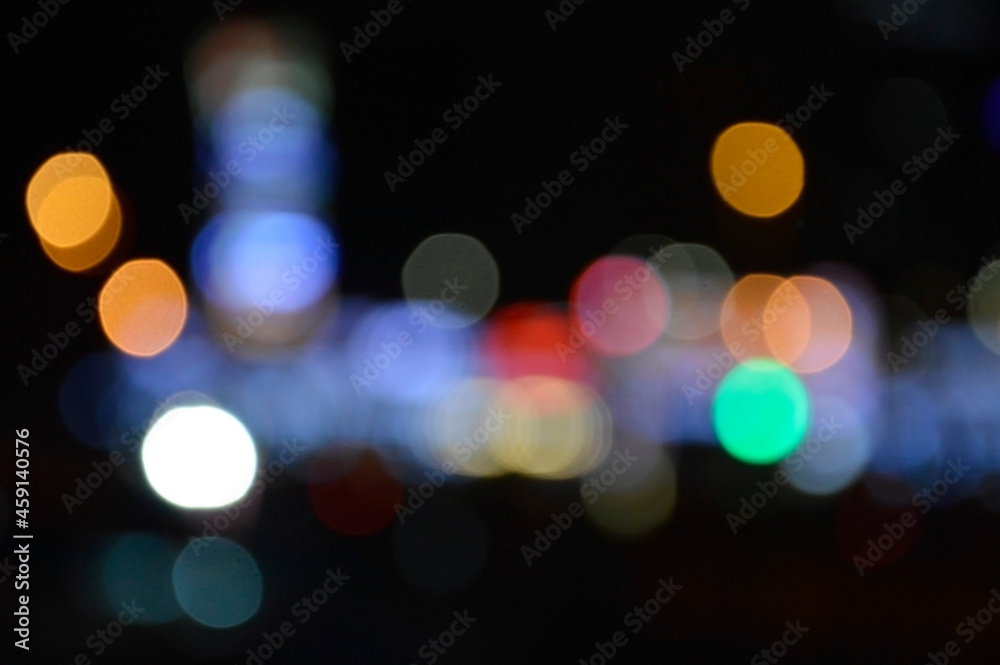 blurred lights of the night city red blue yellow on a black background festive mood bright abstraction background on the desktop blurred lights of the night city red blue yellow on a black background festive mood bright abstraction background on the desktop