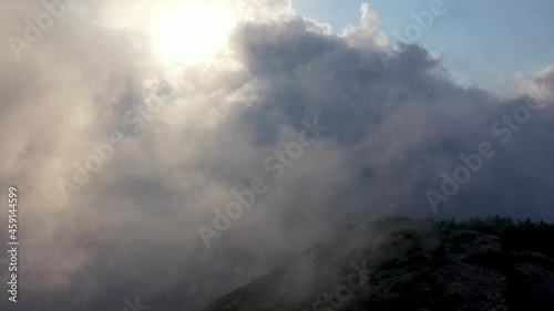 Flying in the clouds is high in the mountains of Turkey photo