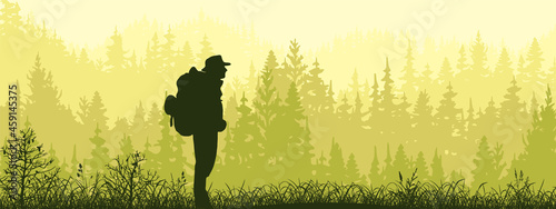 Horizontal banner. Silhouette of tourist with backpack standing on meadow in forrest. Silhouette of man, trees, grass. Magical misty landscape, fog. Yellow, green, black illustration. Bookmark.