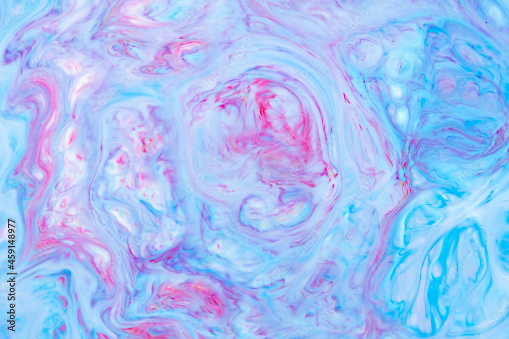 Fototapeta premium Fluid Art. Abstract liquid paint textured background with decorative spirals and swirls. Liquid pink blue backdrop. Trendy wallpaper
