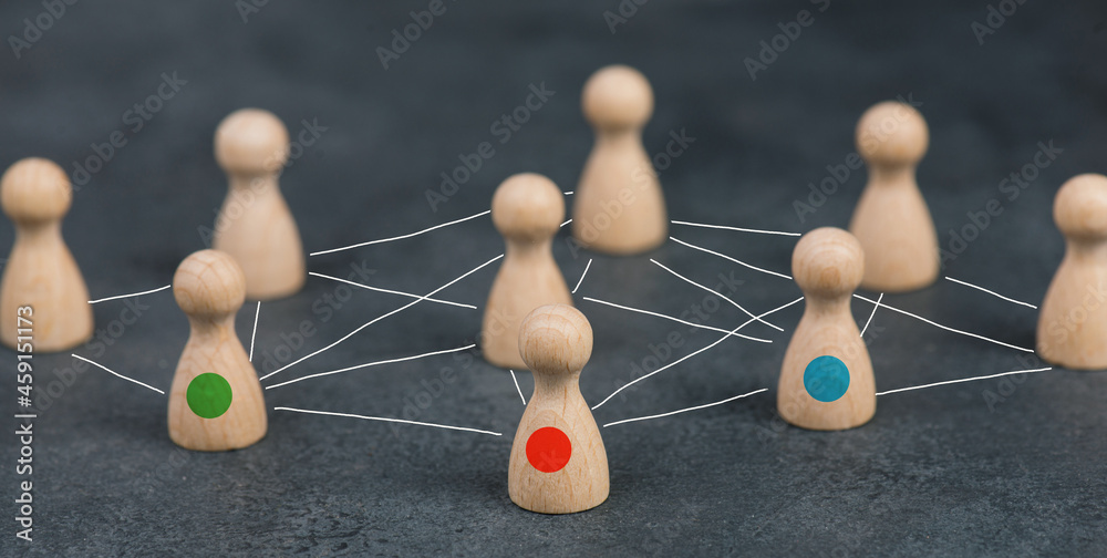 Obraz premium Group of people connecting through a web, business networking and communication