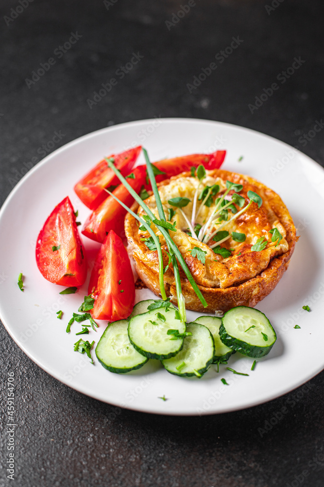 omelet vegetable fried eggs breakfast salad tomato, cucumber fresh meal snack on the table copy space food background omelet vegetable fried eggs breakfast salad tomato, cucumber fresh meal snack on the table copy space food background