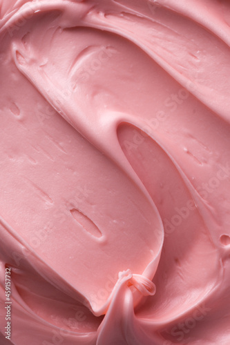 Pink icing frosting close up texture