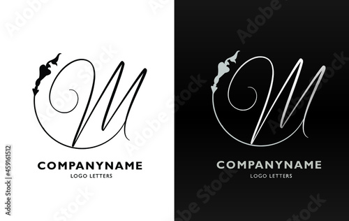 M initial letter of elegant logo. Curved font combined with stylised floral motif. 
