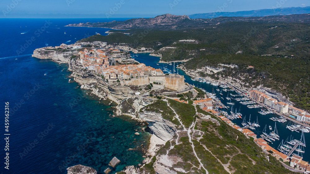 Aerial view of the cape of Bonifacio in the south of the island of Corsica in France - Medieval citadel built on a rocky promontory overlooking the Mediterranean Sea