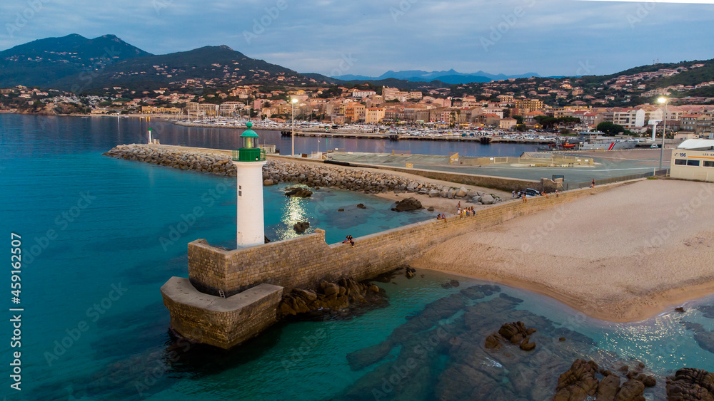 Aerial view of the lighthouse of Propriano in the South of Corsica, France - Small coastal town in the Mediterranean Sea