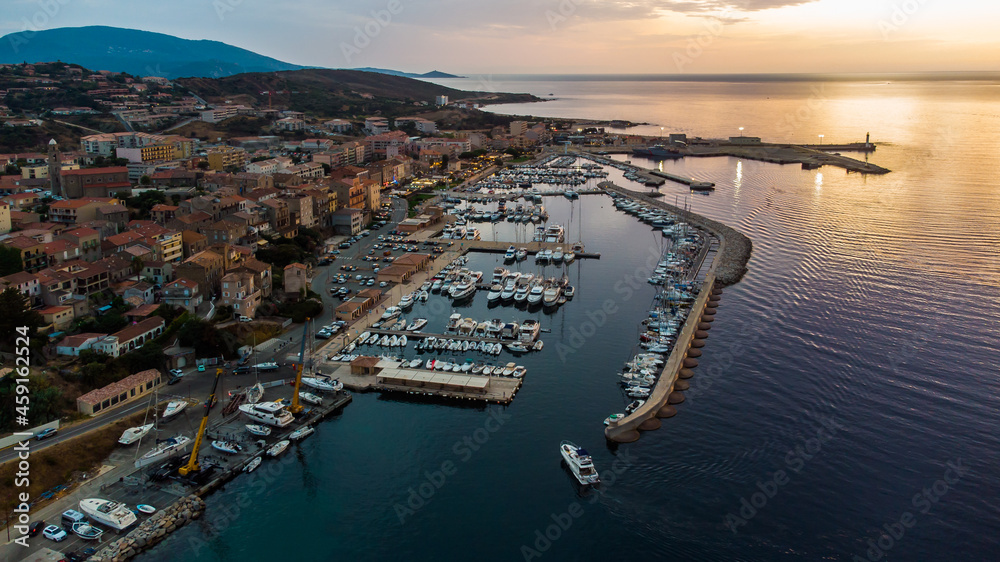 Aerial view of the marina of Propriano in the South of Corsica, France - Small coastal town in the Mediterranean Sea