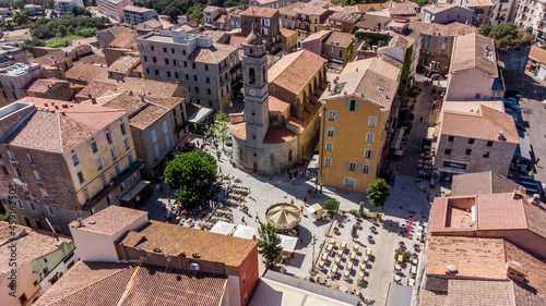 Aerial view of the Place de la République in the old city center of Porto-Vecchio in the South of Corsica, France - Church of Saint John the Baptist in a citadel built by the Genoese