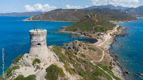 Aerial view of the remains of the Genoese Tower of La Parata built on an overlook at the end of a cape near Ajaccio in Corsica, France photo