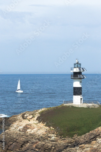 Seascape whit the lighthouse of 'Pancha island' in the coast of Ribadeo, Galicia, Spain