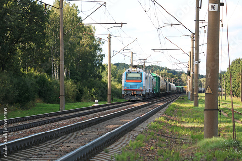 powerful locomotive with a freight train