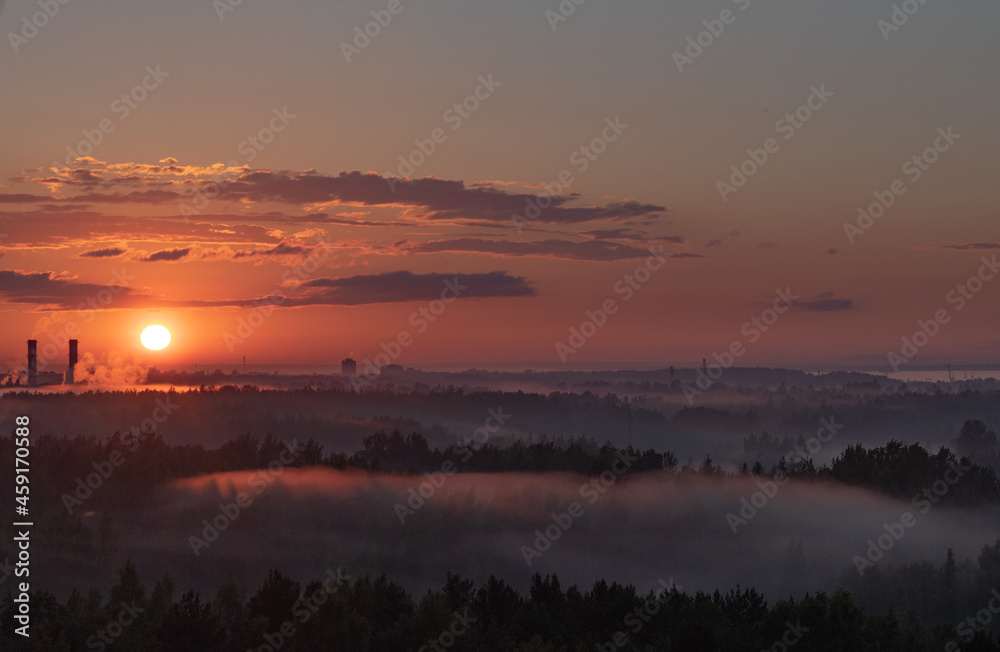 Fototapeta premium A sunset near Lomonosov, view to the Sun from a roof