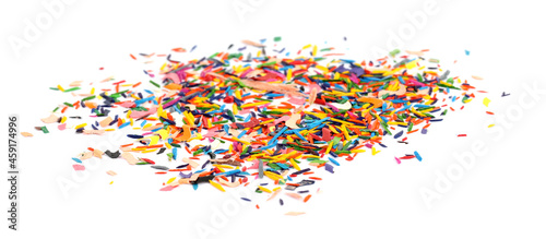 Colorful graphite crumbs on white background. Pencil sharpening
