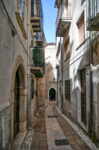Fototapeta Naklejka Na Ścianę i Meble -  A narrow street in Monteroduni, a medieval town of Molise region, Italy.