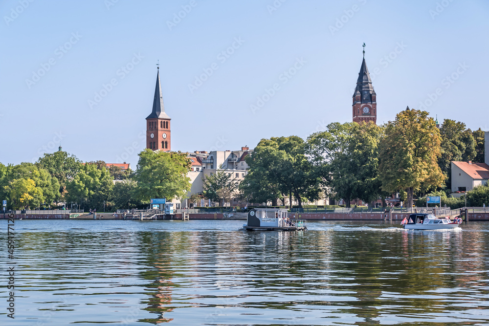 View over the river Dahme with pleasure boats at the old city of Koepenick in Berlin, Germany