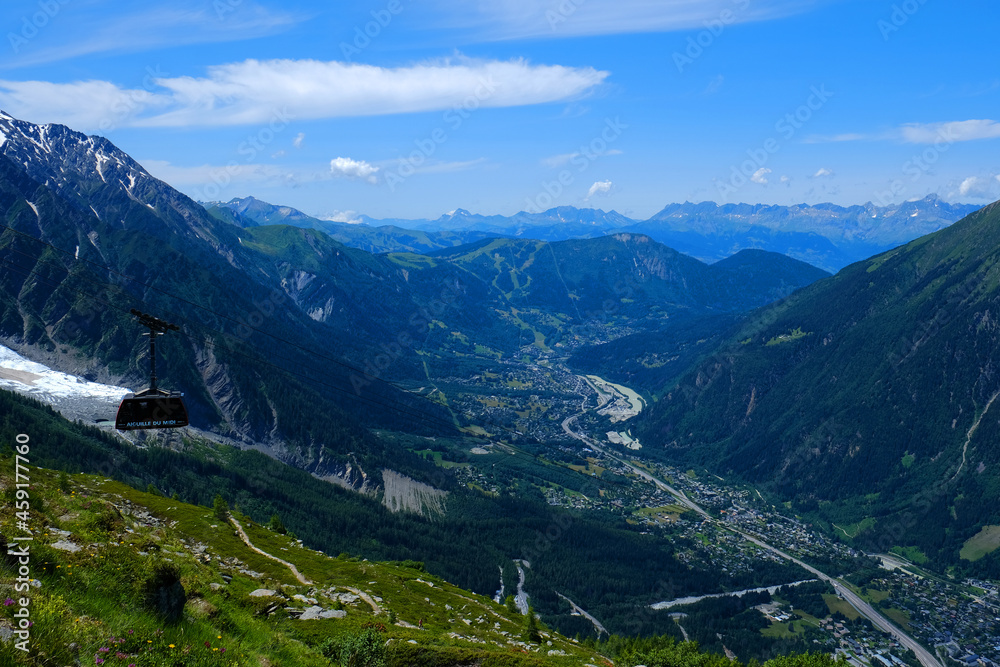 Amazing landscape with Chamonix Valley and cable car coach going to the Aiguille du Midi 3842 m mountain in the Mont Blanc massif , Chamonix, French Alps, Haute Savoie, France