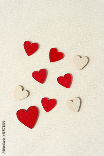 red and plain wooden hearts