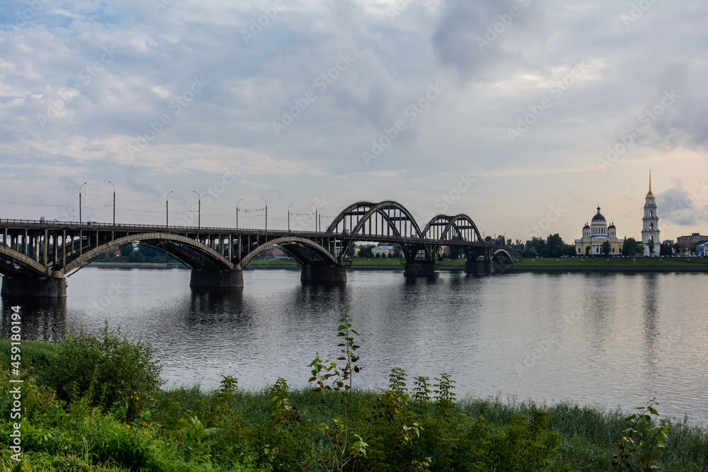 Rybinsk bridge, across the Volga river. Spaso-Preobrazhensky Cathedral, Rybinsk, Yaroslavl region
