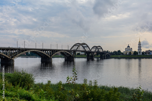 Rybinsk bridge, across the Volga river. Spaso-Preobrazhensky Cathedral, Rybinsk, Yaroslavl region © Konstantin