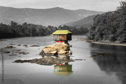Selective color of a famous Drina house, a little colorful cabin on the middle of a river in Bajina Basta photo