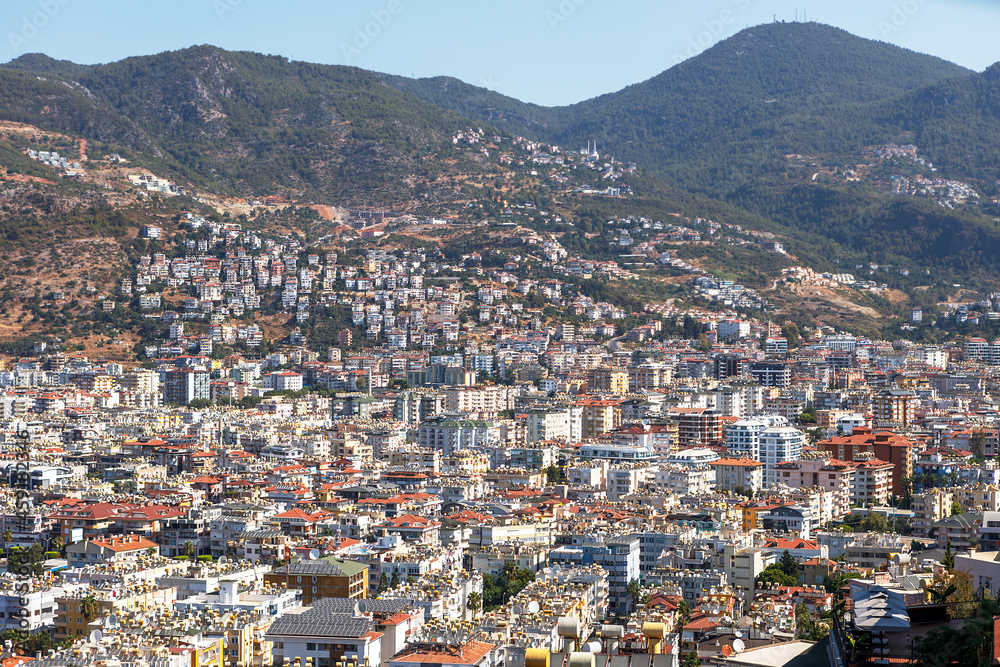 A bird's-eye view of the Turkish city of Alanya on a bright sunny day.