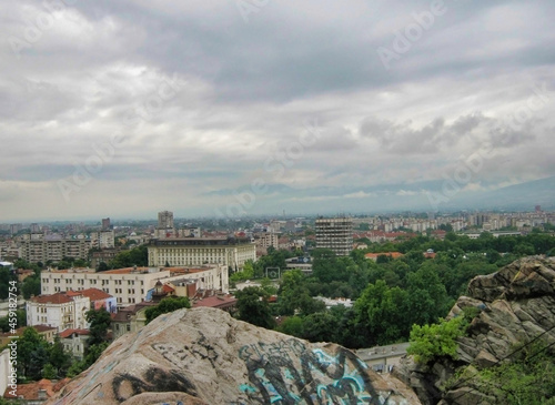 View of the historic center in the city of Plovdiv. Stones with pictures. Roofs of houses and cloudy weather. Balkans. Bulgaria. Europe