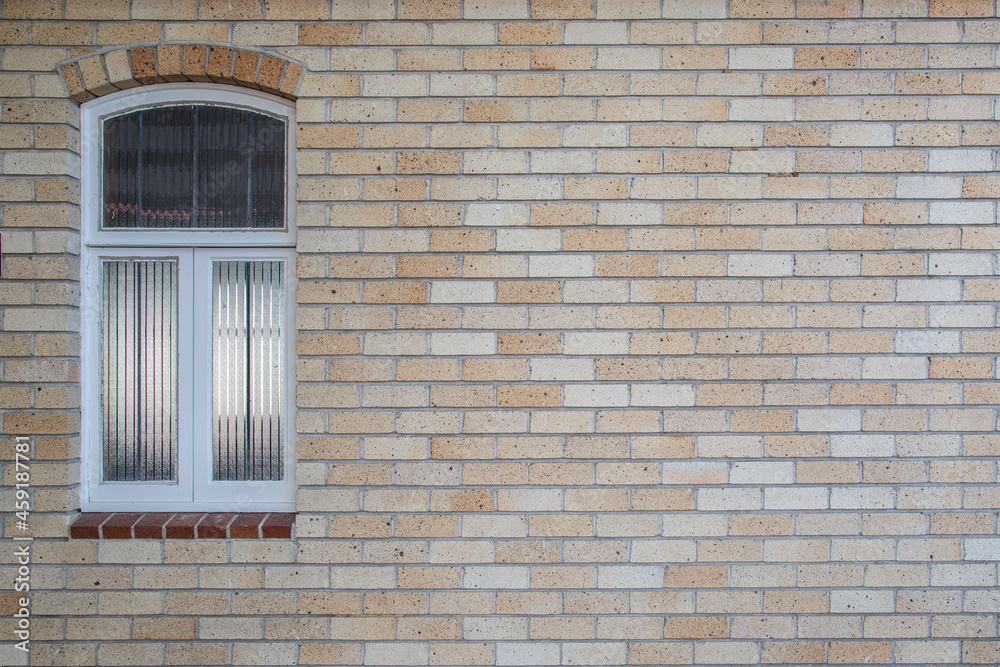 Light Orange Church Brick Wall with White Painted Wood Window Light Orange Church Brick Wall with White Painted Wood Window