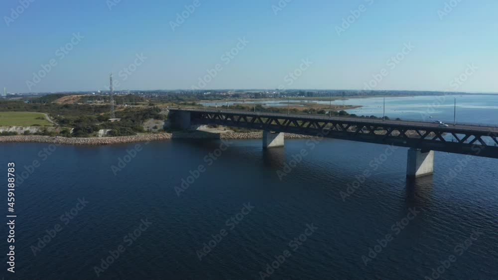 Panoramic aerial view of the Oresundsbron bridge between Denmark and Sweden. Close up view of the Oresund Bridge on a clear sunny day. Panoramic aerial view of the Oresundsbron bridge between Denmark and Sweden. Close up view of the Oresund Bridge on a clear sunny day.