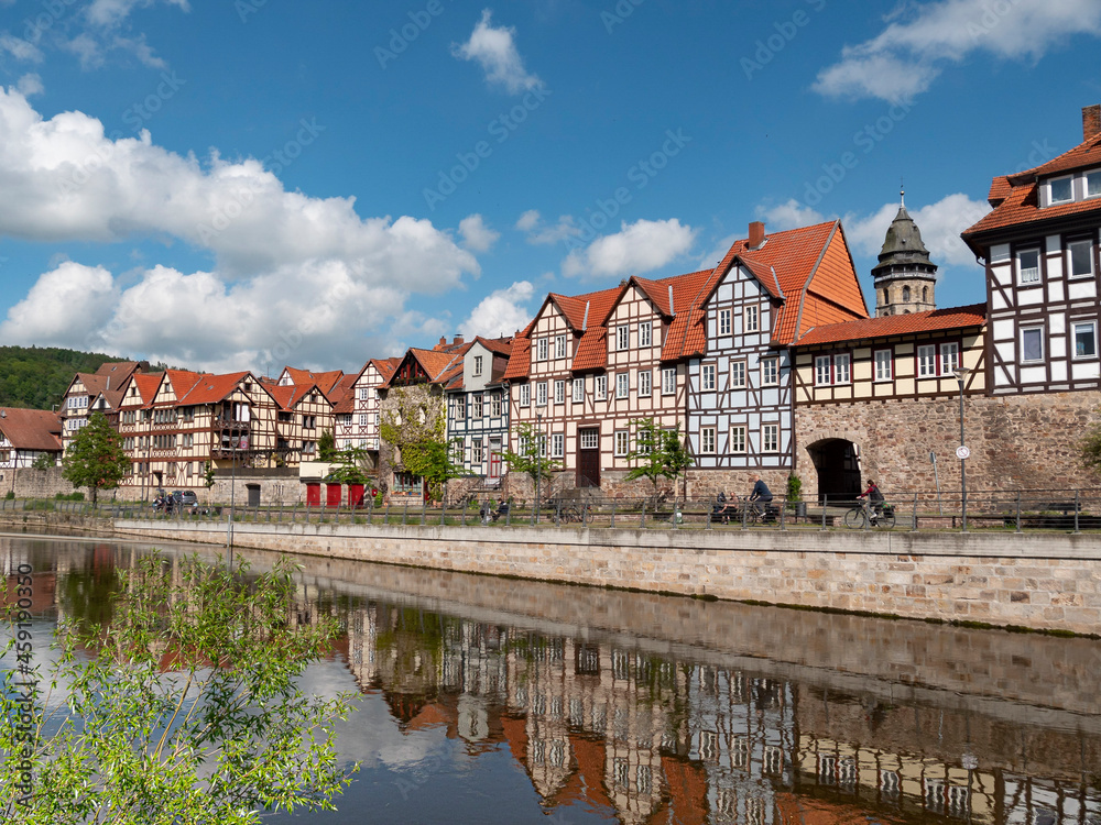Panorama of colorful houses at the Fulda riverside in historic town Hannoversch Munden, Germany
