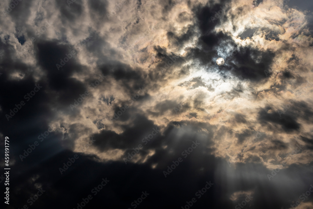Dramatic stormy sky with sun rays. Background for winter photography, hallowen and fear. Dramatic stormy sky with sun rays. Background for winter photography, hallowen and fear.