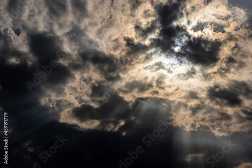 Dramatic stormy sky with sun rays. Background for winter photography, hallowen and fear.