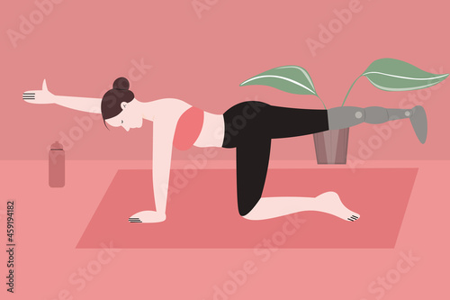 A young disabled woman with a prosthetic leg is doing yoga assana on a mat. Concept about body positivity and self esteem. Sports for people with disabilities. Amputated woman