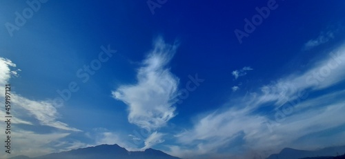 Bandung, West Java Indonesia - September 25, 2021: cloud photo object like smoke with a blue sky background in the Indonesian sky
