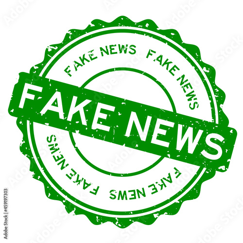 Grunge green fake news word round rubber seal stamp on white background
