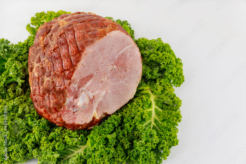 Delicious honey smoked pork ham on white background. Delicious honey smoked pork ham on white background.