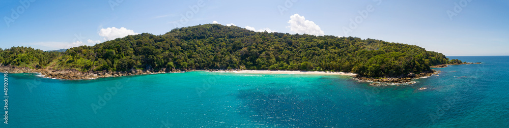 Aerial view drone shot Amazing panorama Freedom beach at phuket island beautiful island in thailand Amazing High angle view Island seashore with blue sky cloudy sky background Travel holiday Concept