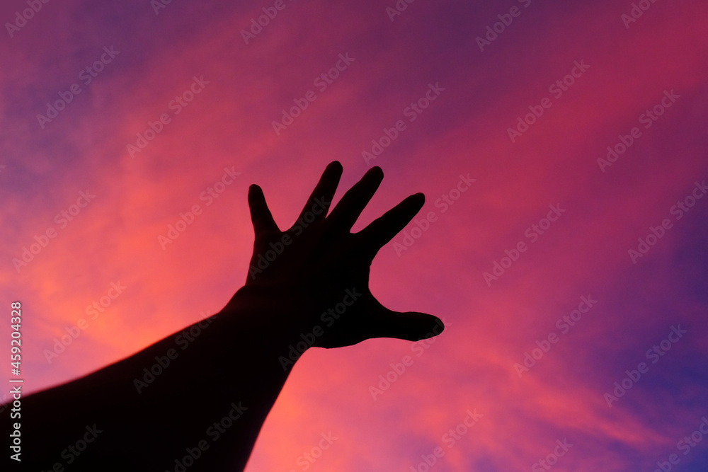 Silhouette of hand sign