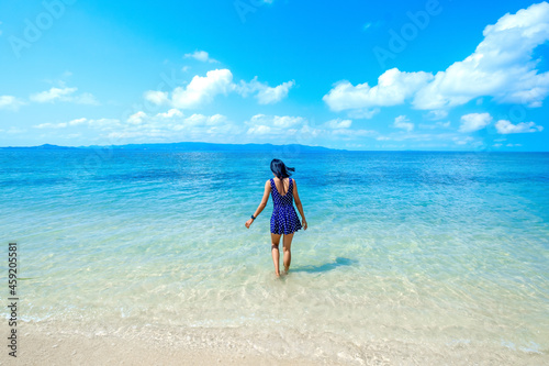 Принти на полотні woman in blue dress on the beach, at leela beach koh phangan ,suratthani,thailan