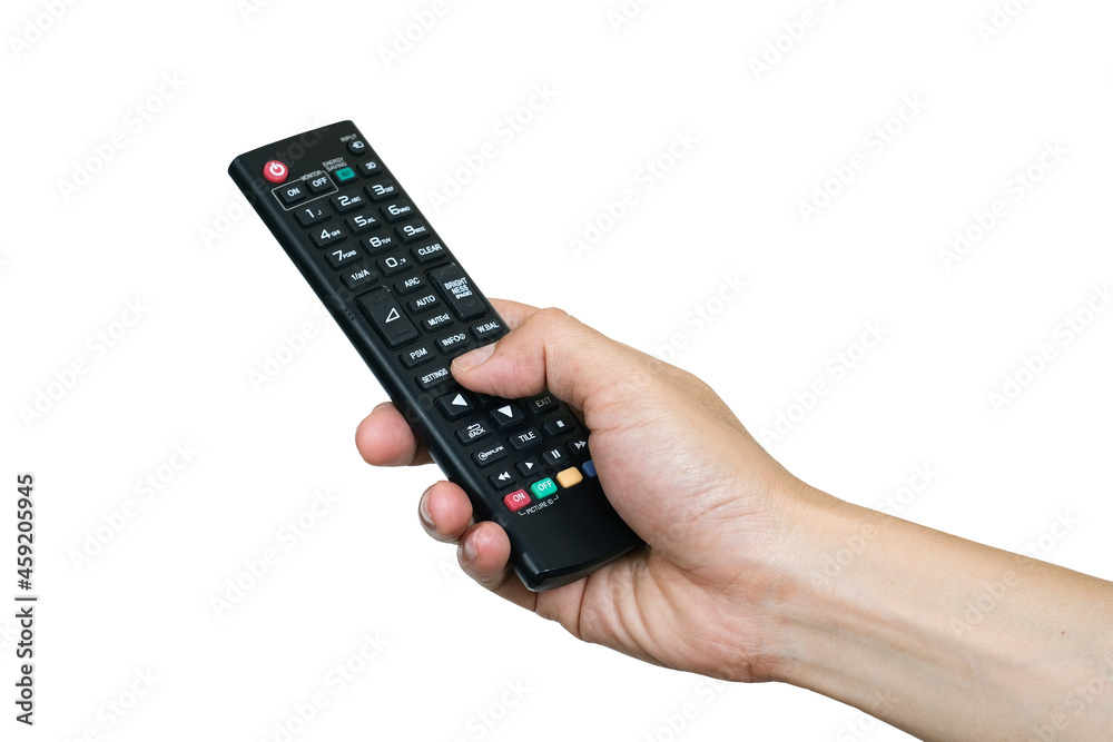 His hand is holding the remote control and operate the remote control. on the White Background . Concept of Technology His hand is holding the remote control and operate the remote control. on the White Background . Concept of Technology