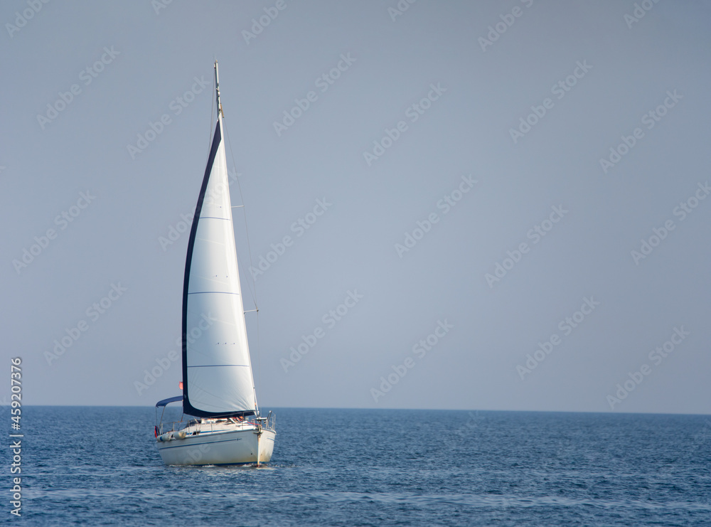 White sailing yacht at sea. Wonderful summer seascape.