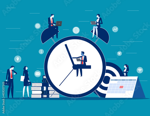 Business team and Huge clock with working to meet the deadline