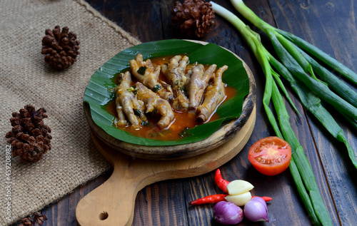 Delicious Rica-Rica Ceker Ayam - Indonesian Traditional Food made from Chicken Feet and Cooked on Chicken. photo