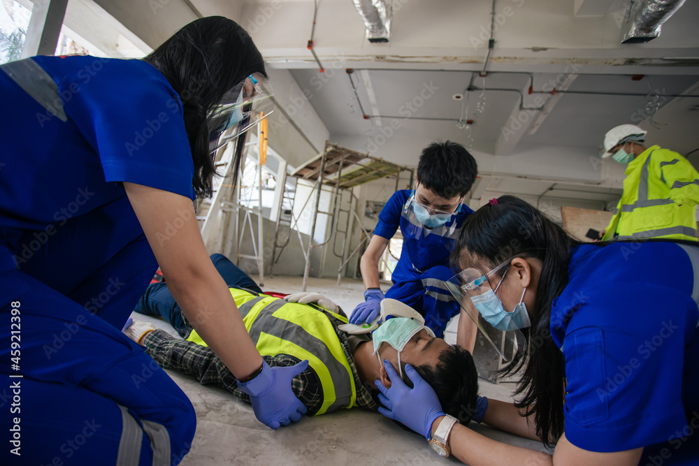 Paramedic team first aid builder accident in site work. Employee