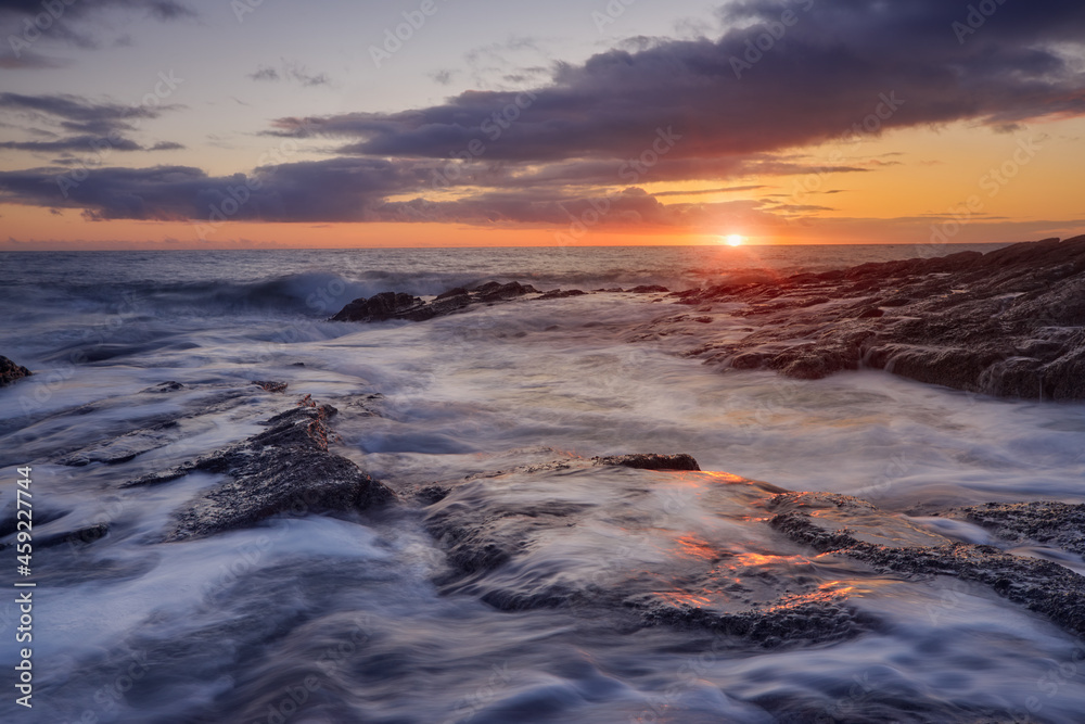 Rathmoylan Cove, Waterford, Ireland. Stunning rocks and sunset. Rathmoylan Cove, Waterford, Ireland. Stunning rocks and sunset.