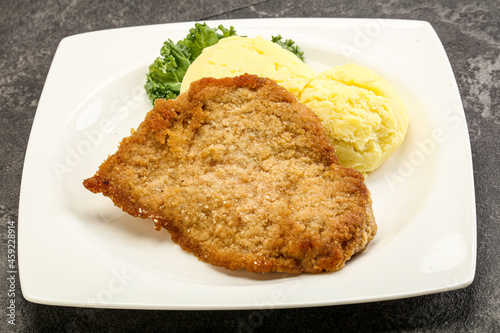 Crispy chicken schnitzel with mashed potato