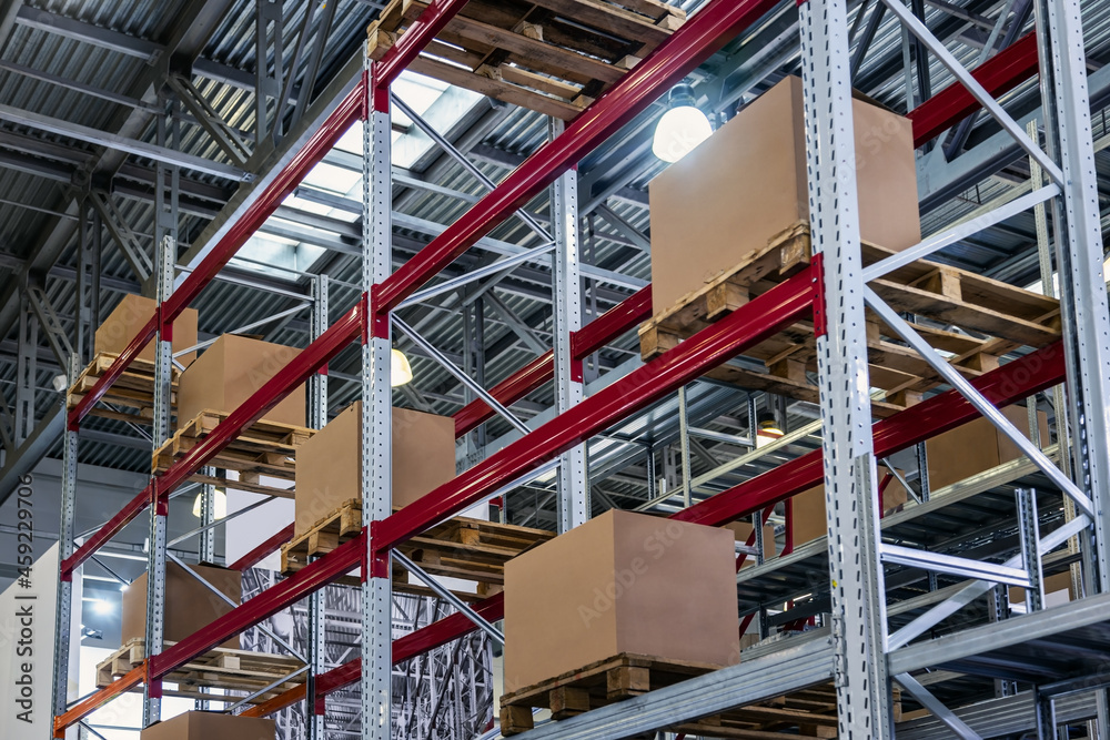 Retail Warehouse full of Shelves with Goods in Cardboard Boxes Retail Warehouse full of Shelves with Goods in Cardboard Boxes