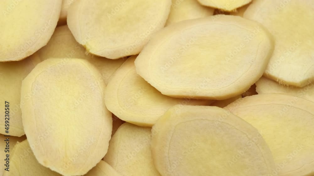 sliced ginger root rotate. Healthy food concept sliced ginger root rotate. Healthy food concept