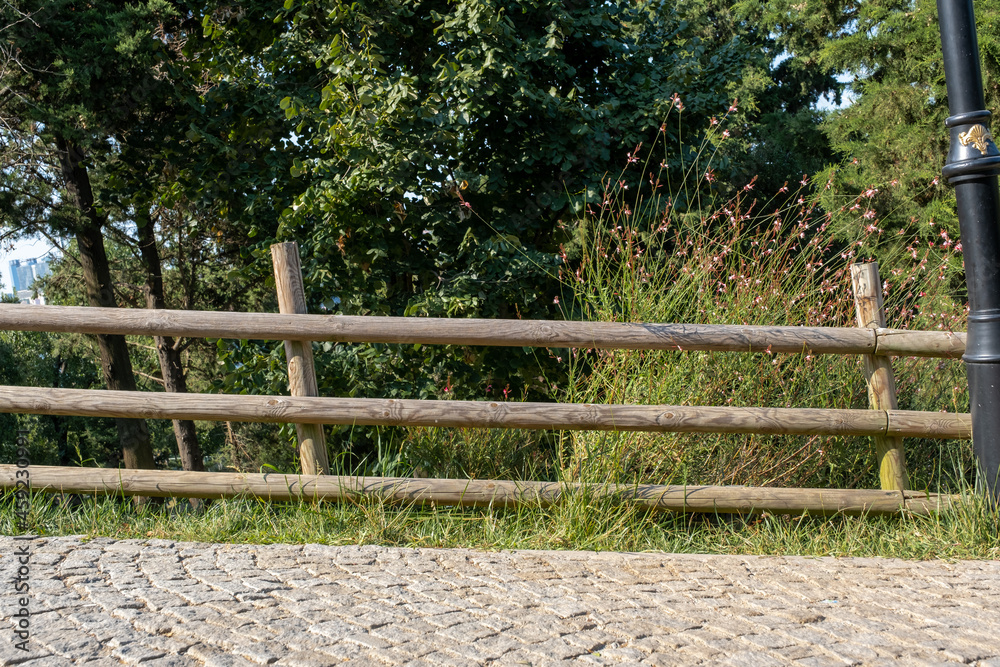 Front view roadside wooden fence Front view roadside wooden fence