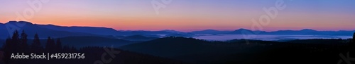 Panoramic landscape with mountains seen from above in the evening © sebi_2569